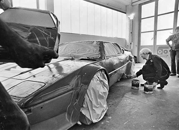 Andy Warhol in process of painting BMW M1