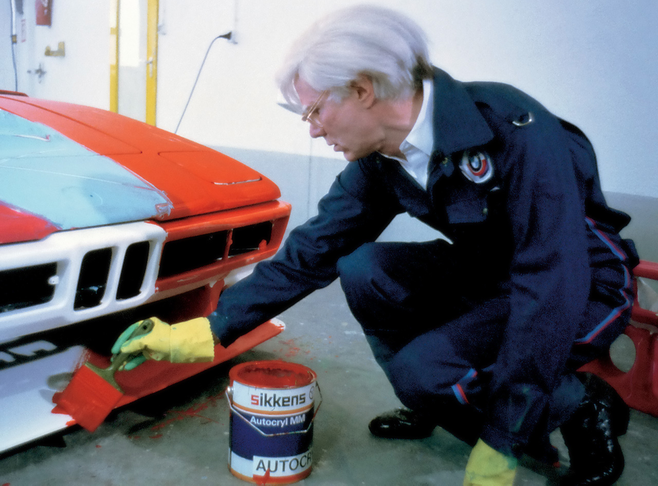 Andy Warhol in process of painting BMW M1